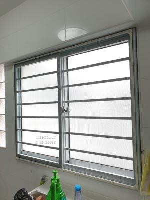 HDB Sliding Window with grilles in Grey at Bedok