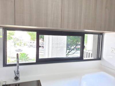 Condo 2-panel sliding window at kitchen sink in BLACK at Serangoon